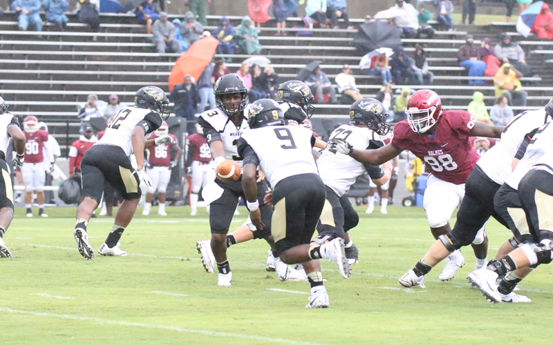 No. 11 Holmes Drops ECCC 49-14 in Opener