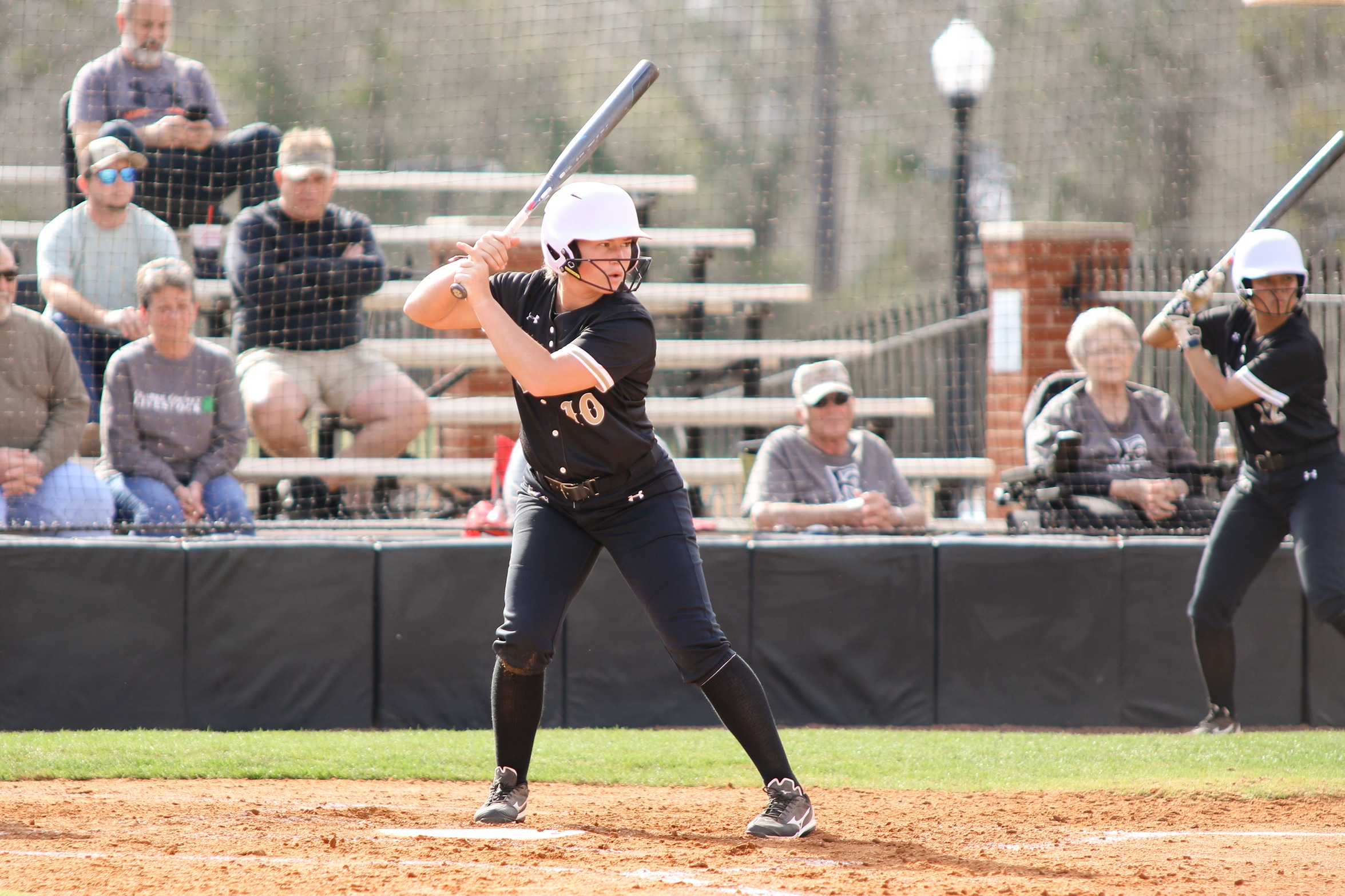 Lady Warriors Split Twin Bill with MMI